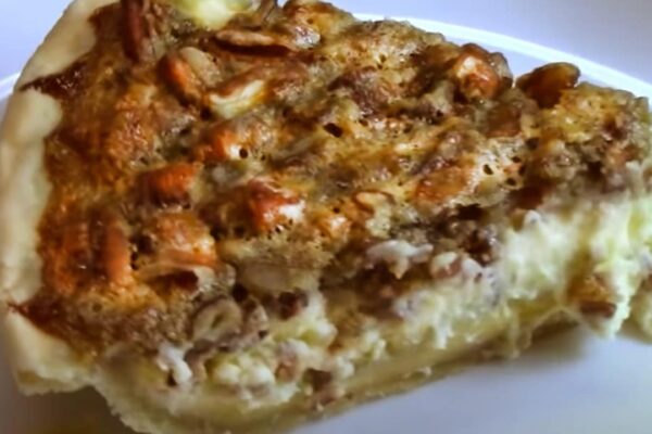 a Pecan Cheesecake Pie for Thanksgiving, homemade and freshly served