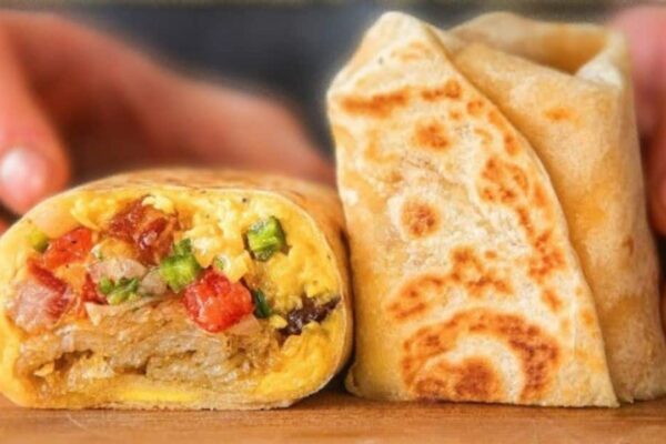 Perfect Cheesy Bacon Egg Breakfast Burrito, homemade and freshly served