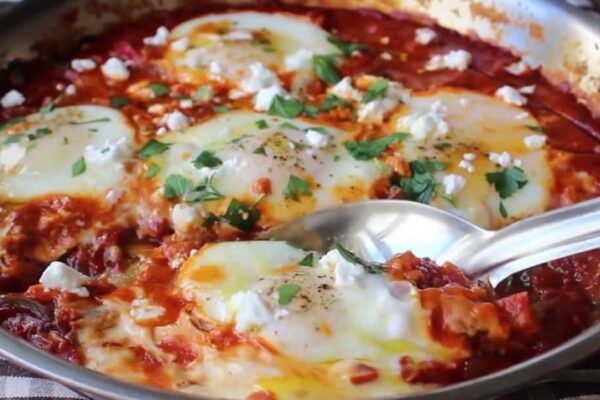 Poached Eggs In Spicy Pepper Tomato Sauce, homemade and freshly served