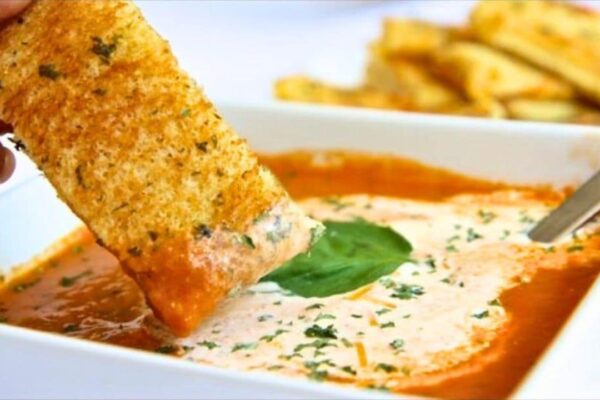 Roasted Tomato Soup With Grilled Cheese Sticks, homemade and freshly served