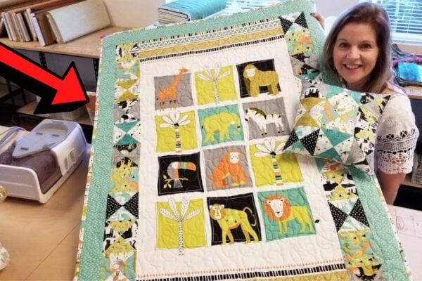 Finished Simple Baby Quilt Using 1 Panel & 1 Charm Pack, a completed DIY project