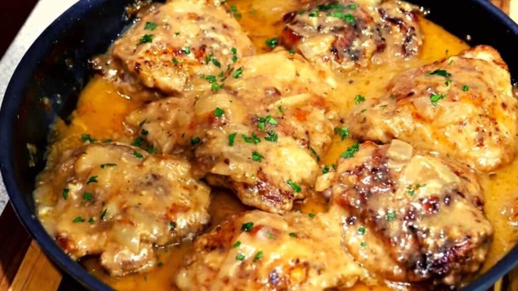 Skillet Smothered Chicken And Gravy, homemade and freshly served