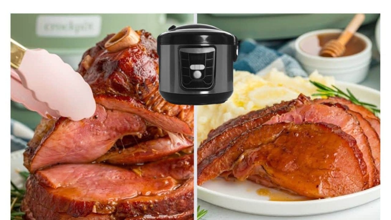 Slow cooker spiral ham glazed dark and glossy on a platter garnished with fresh rosemary, parsley and thyme
