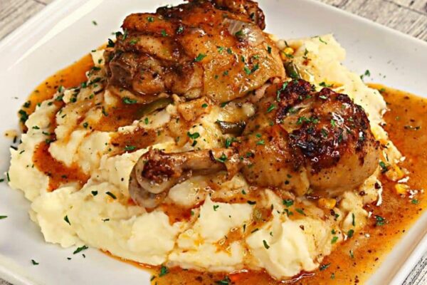 Smothered Chicken & Gravy With Creamy Mashed Potatoes, homemade and freshly served