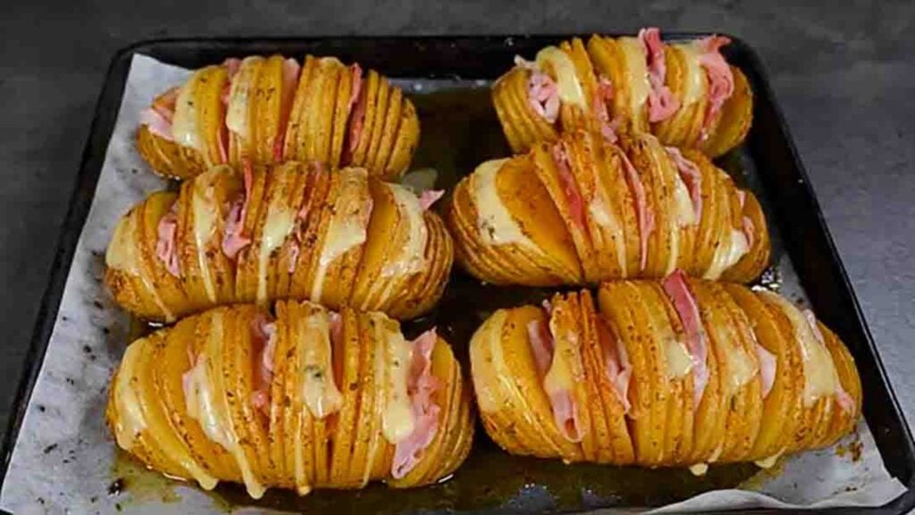 Stuffed Hasselback Potatoes, homemade and freshly served