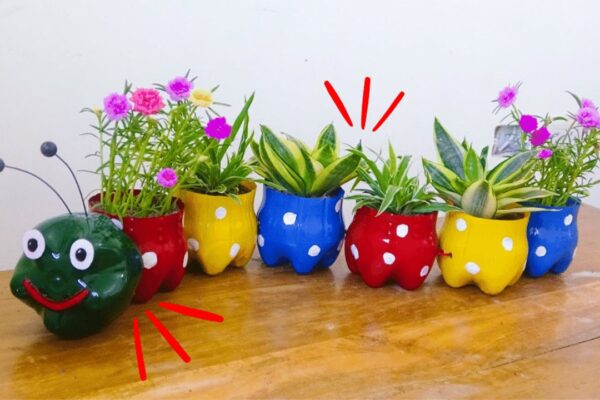 Finished Worm-Shaped Flower Pots From Plastic Bottles, a completed DIY project