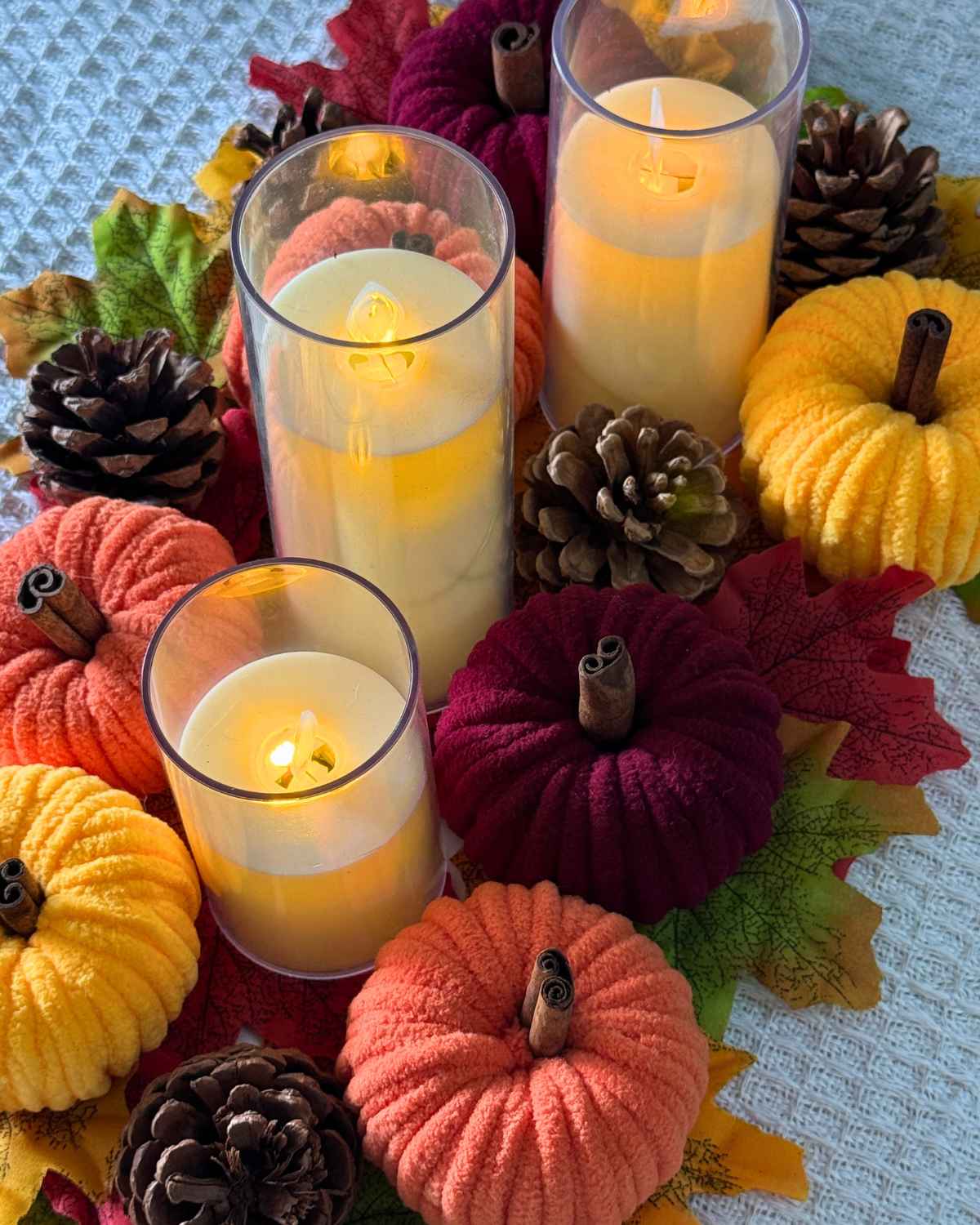 Pumpkin Crafts - yarn pumpkins in fall colors displayed together