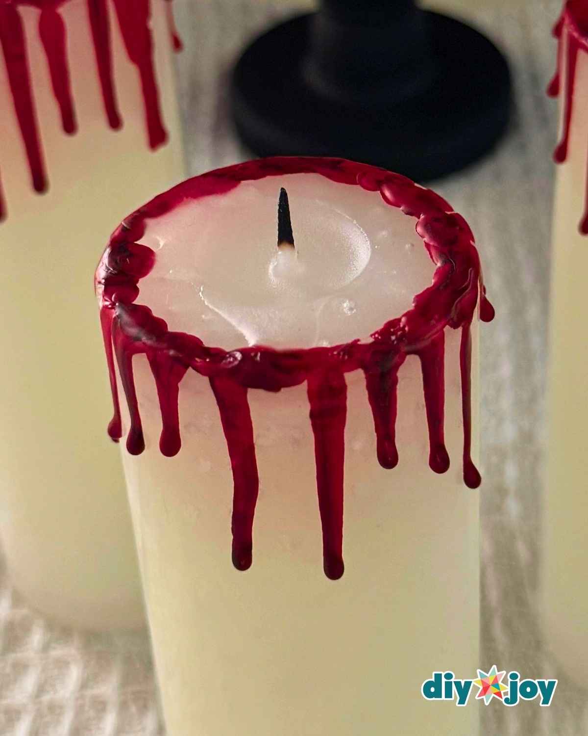 Realistic blood candle made from crayons for a gothic Halloween centerpiece
