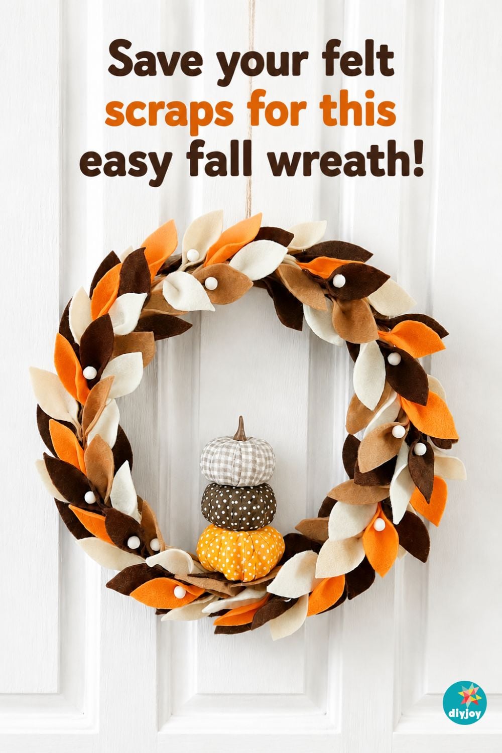 DIY fall wreath tutorial - felt leaf wreath with fabric pumpkins and text reading save your felt scraps