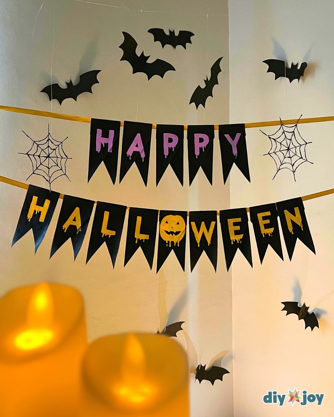 DIY Halloween decor - the handmade Halloween banner styled on display