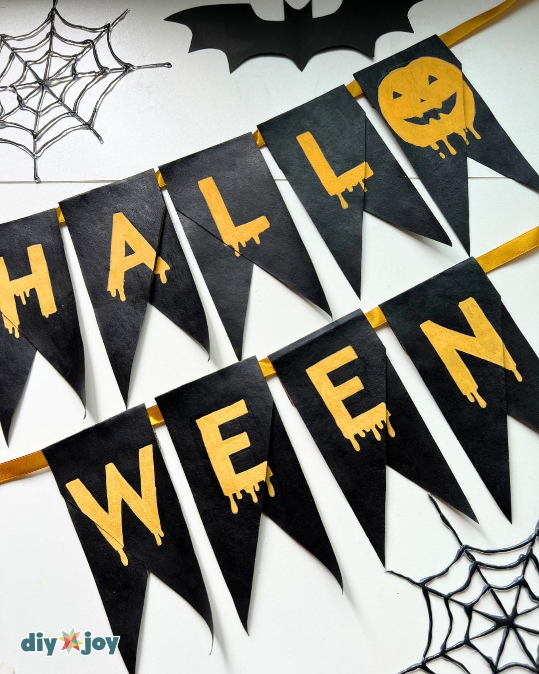 Easy Halloween crafts - the Happy Halloween banner displayed for the season