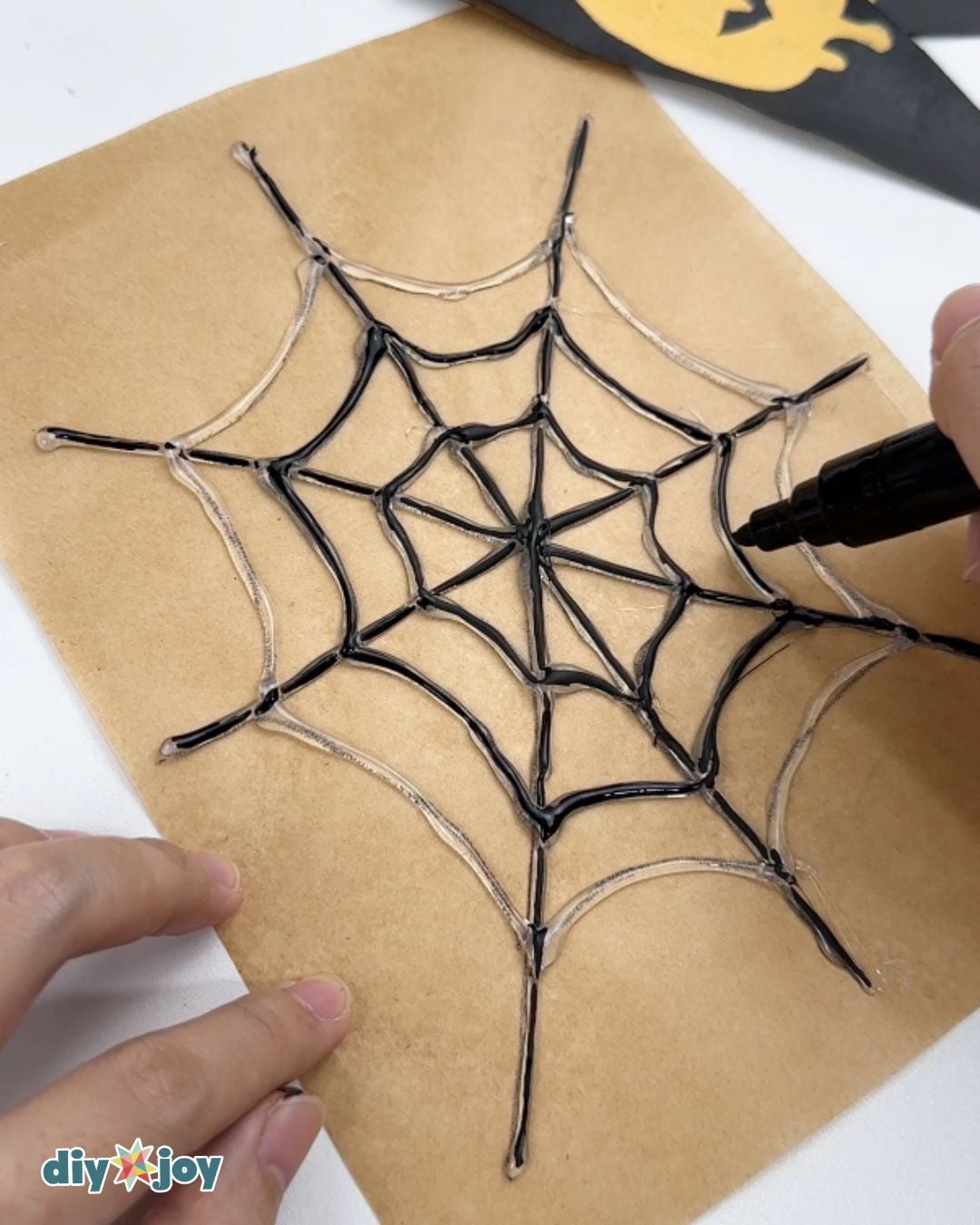 Glue gun spider webs