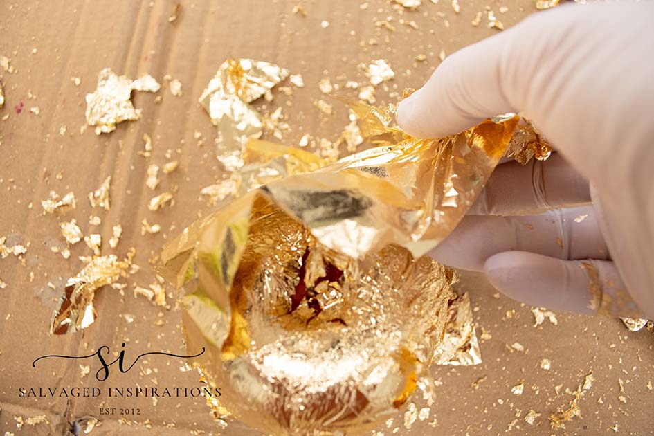 DIY apple craft with creative seasonal tutorial and rustic autumn home accent, showing the finished gilded apples