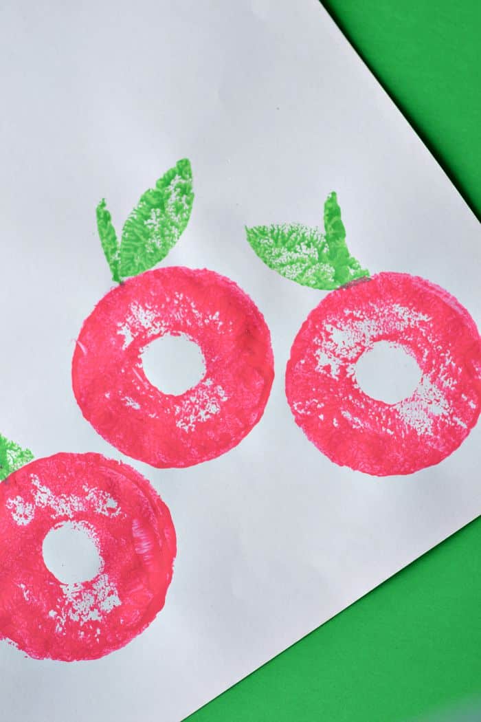 Seasonal DIY craft, fruit-season decorating idea highlighting the finished pool noodle fruit stamping craft