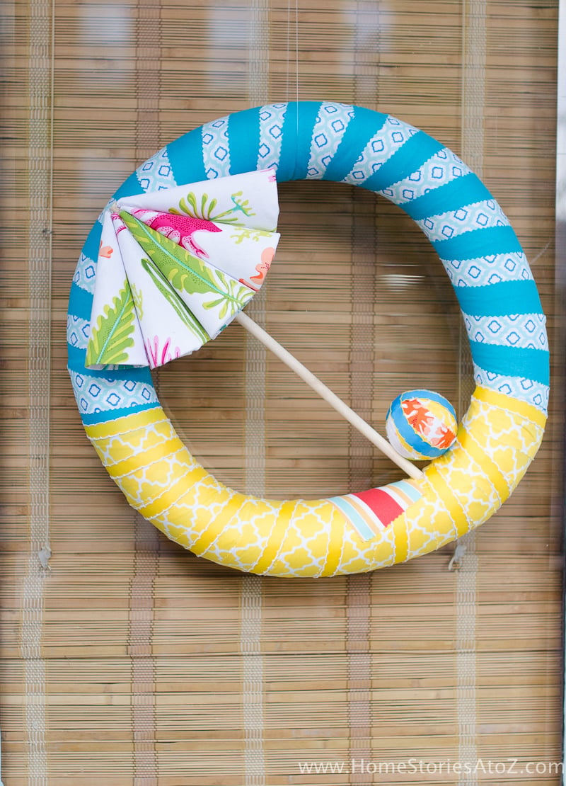 DIY Beach Umbrella Wreath, one of the best summer decor ideas on this list and an idea worth saving for later