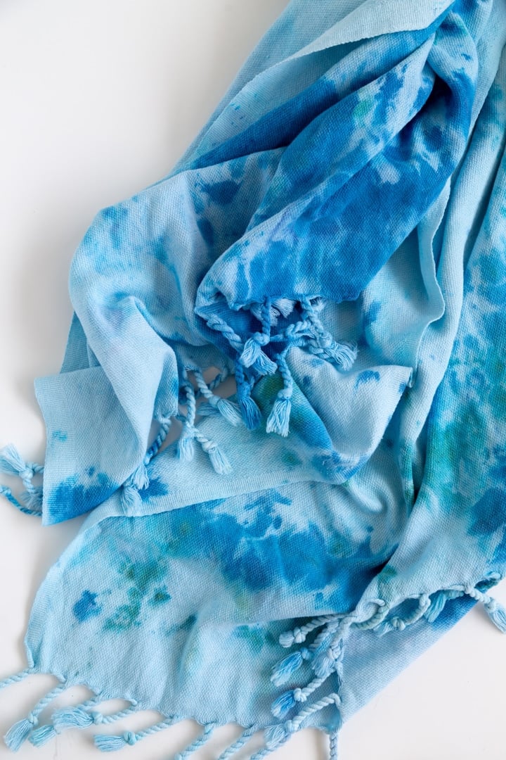 DIY Ice Dyed Beach Towel, one of the best summer decor ideas on this list and a fun project the whole family can help with