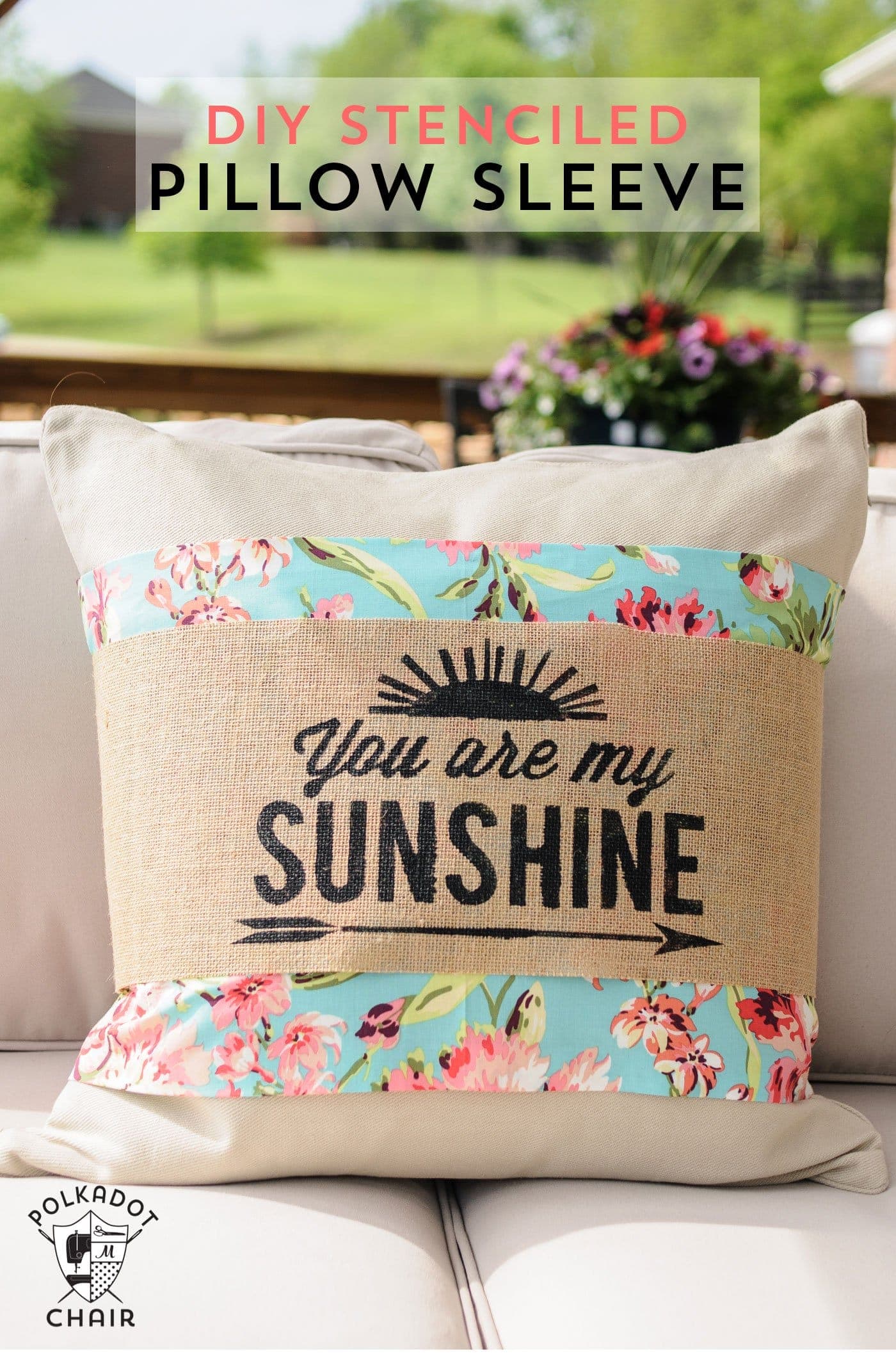 Stenciled You Are My Sunshine burlap pillow sleeve on an outdoor sofa, an easy seasonal pillow cover craft