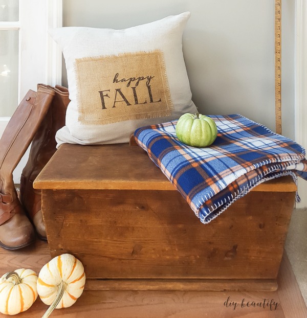 Happy Fall printed burlap patch sewn onto a pillow cover, an easy home printer DIY fall decor project