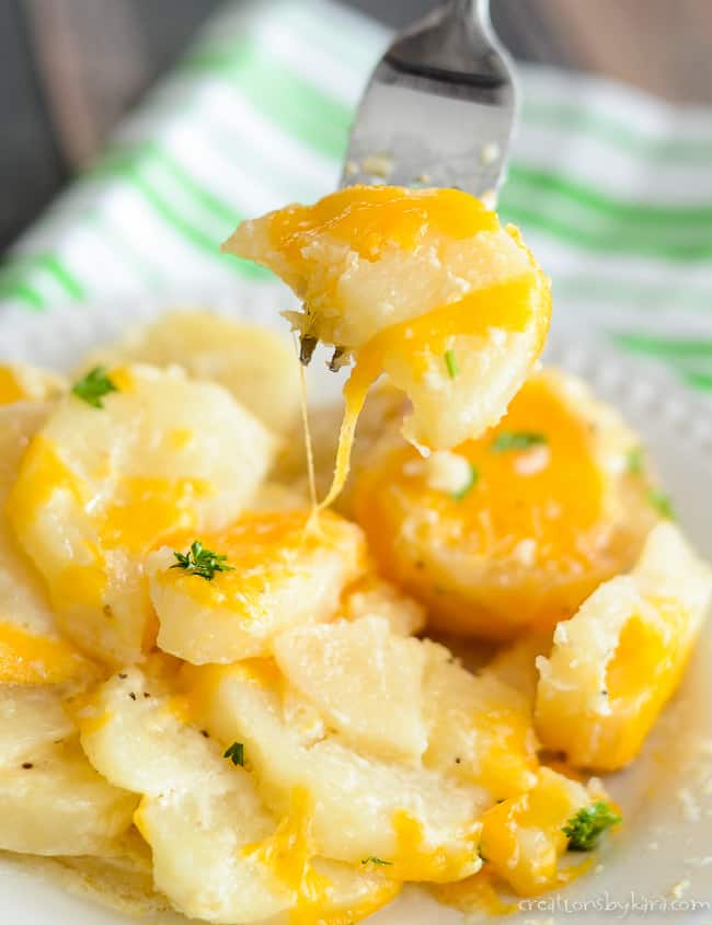 Cheesy slow cooker scalloped potatoes, a hands off Thanksgiving side dish recipe that frees up oven space for the turkey