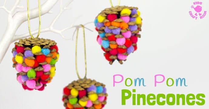 DIY pom pom pinecone mobile craft for kids, colorful pom poms glued into pinecones and hung by gold twine from branches