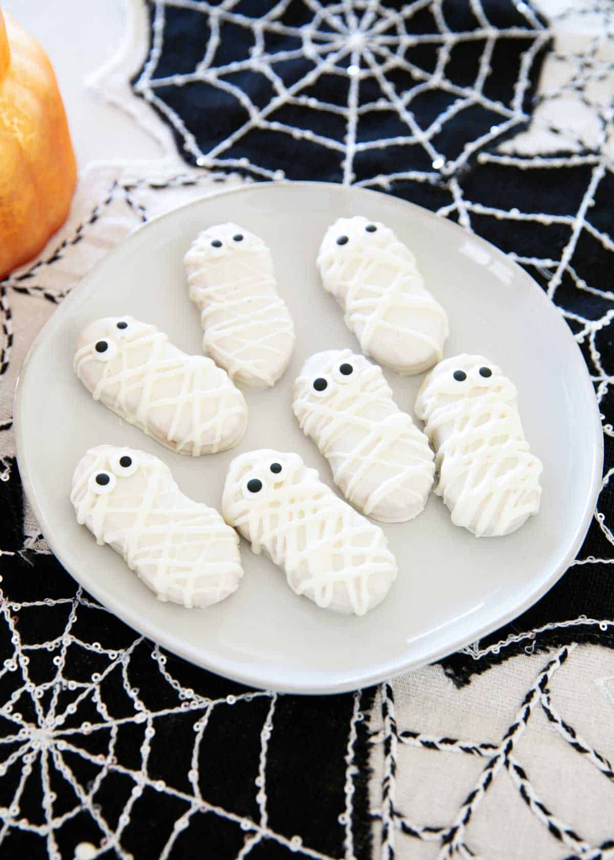 Spooky cookie tutorial, festive homemade sweet and easy decorating tutorial, focused on nutter butter mummies