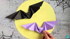 Halloween paper bats origami craft, a colony of finished flapping bats