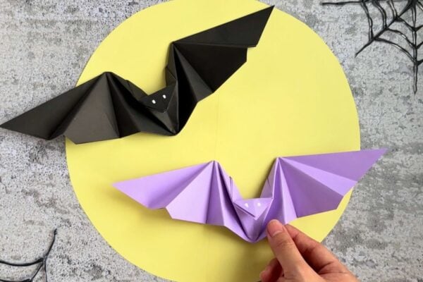 Halloween paper bats origami craft, a colony of finished flapping bats