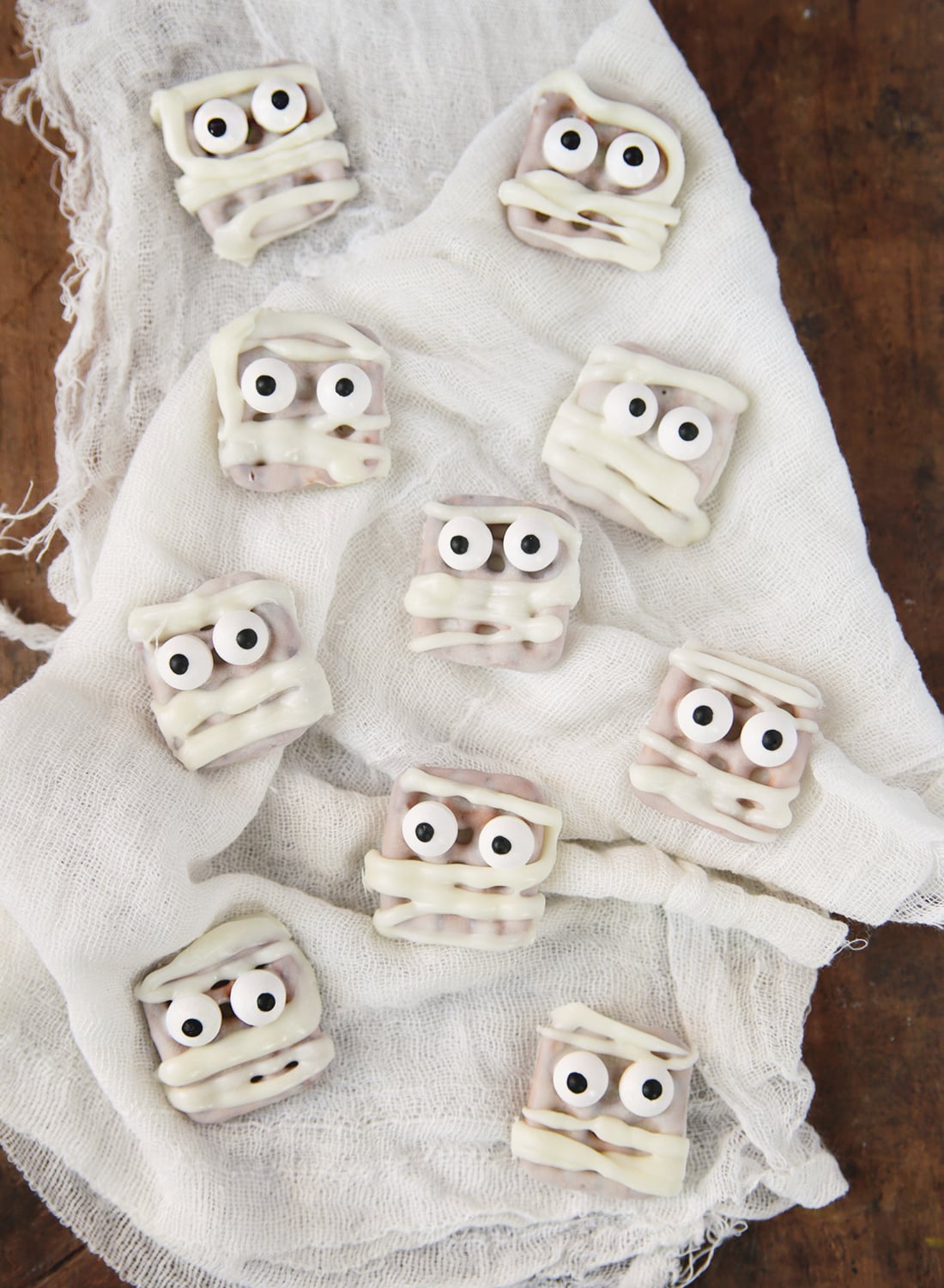 Easy party snacks, festive appetizer inspiration and homemade party-table idea, highlighting white chocolate mummy pretzels
