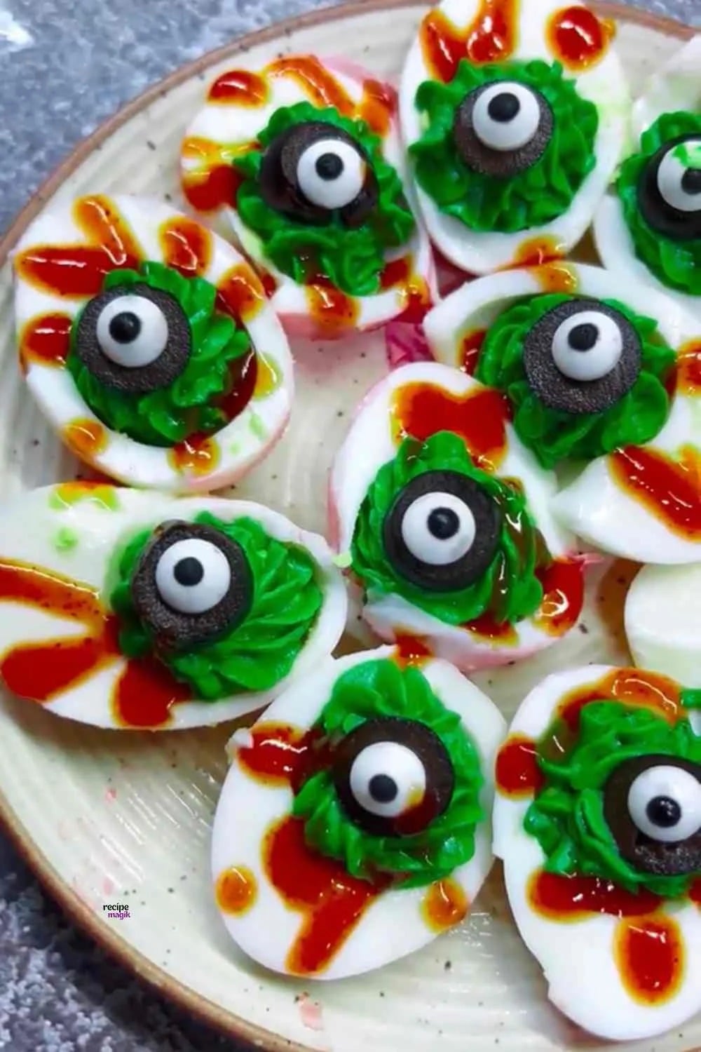 Party recipe idea with kid-friendly spooky serving and savory or sweet party dish, showing the finished spooky deviled eggs