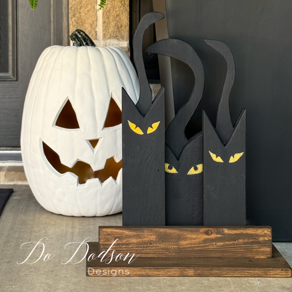 Spooky seasonal display with outdoor Halloween project and creative home craft, featuring the finished wooden black cat