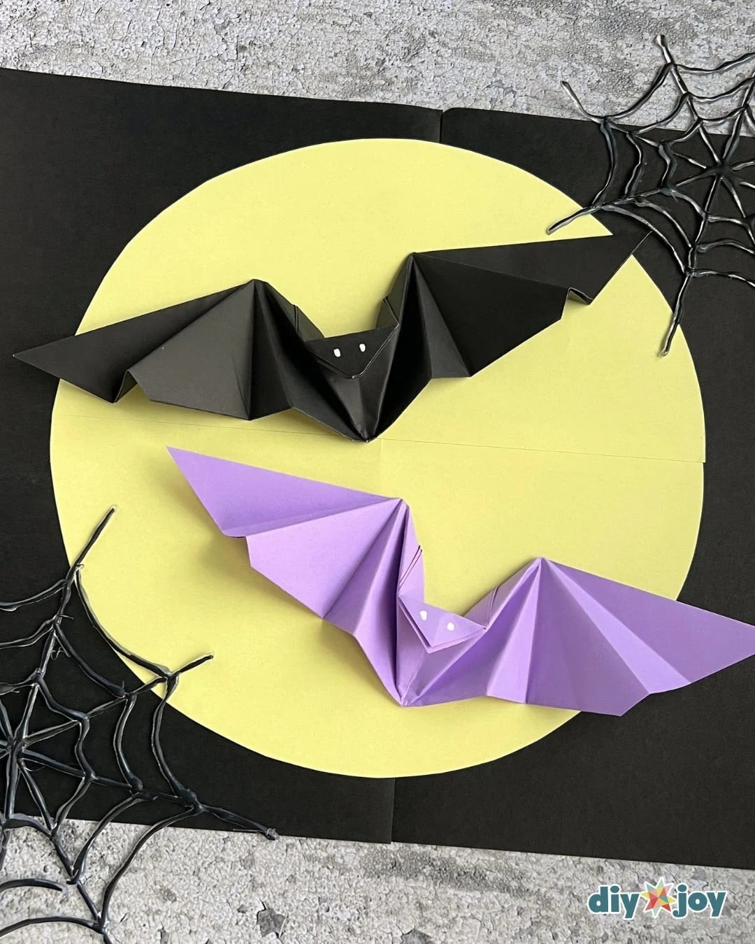 Origami bat folded from black paper for Halloween