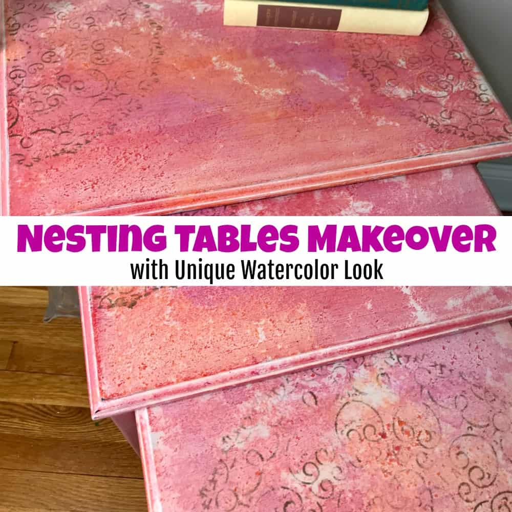 Nesting tables refinished with a soft watercolor paint effect, a colorful furniture makeover