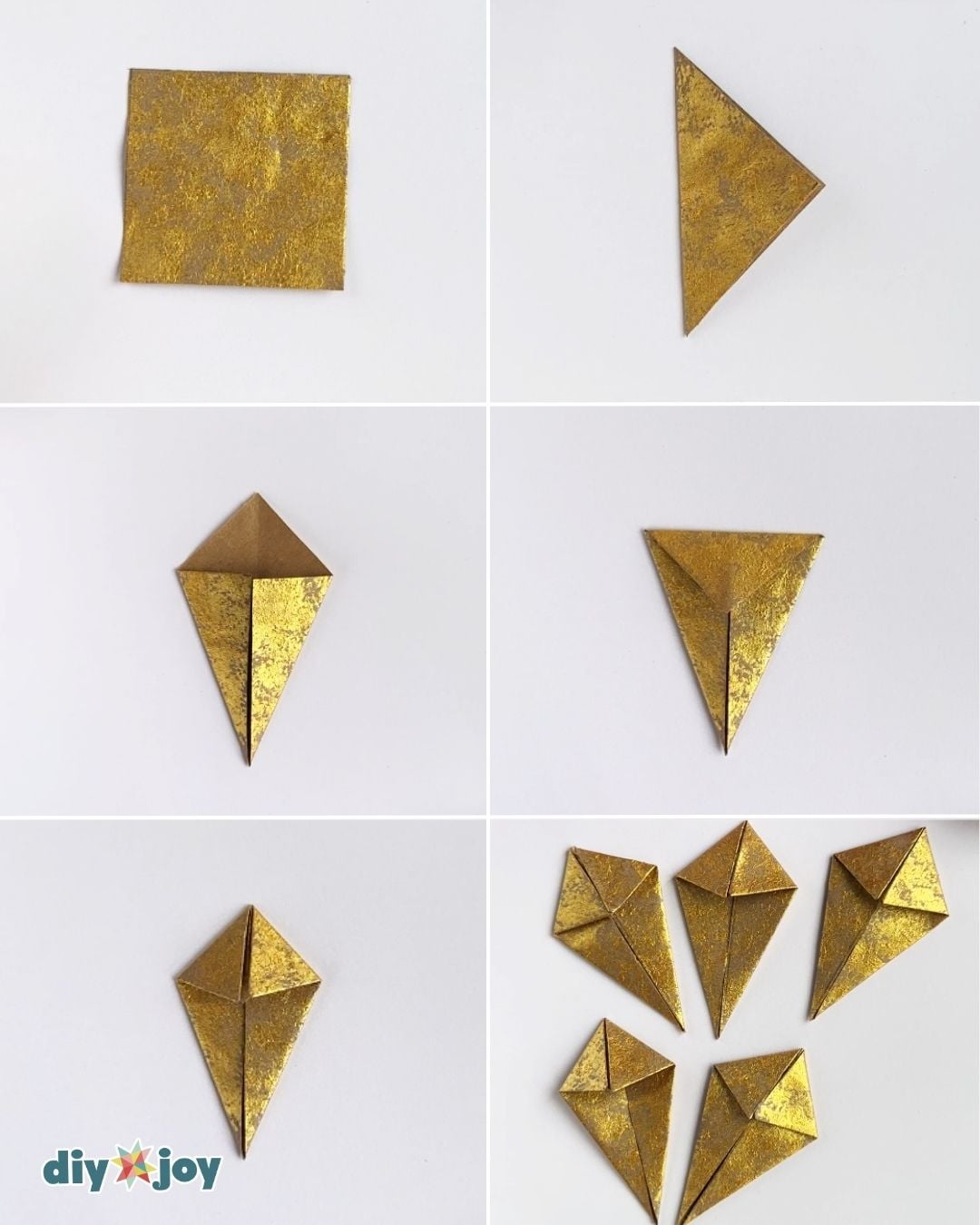 Folded paper star craft - diagonal folds turning a painted square into a kite shaped point, step two