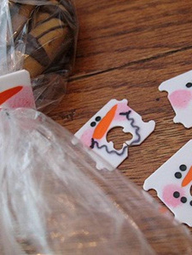 How to Wrap a Gift Wrapping Ideas - Recycled Bread Tag Snowman Gift Toppers - recycled bread tag snowman gift toppers