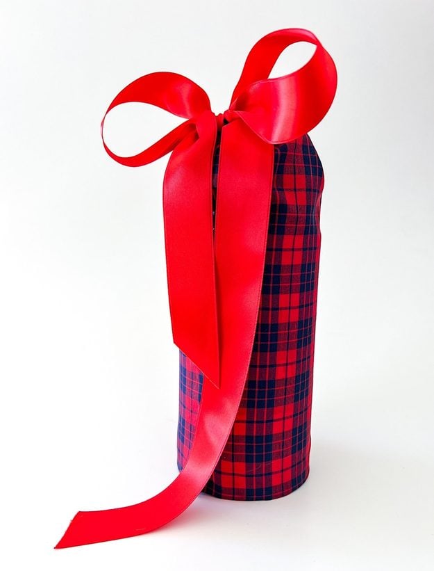 How to Wrap a Gift Wrapping Ideas - Upcycled Oatmeal Canister Gift Holder - upcycled oatmeal canister gift holder