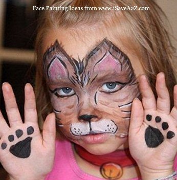 Cat face paint with brown and white fur details, pointed ears, whiskers, a pink nose and matching paw prints