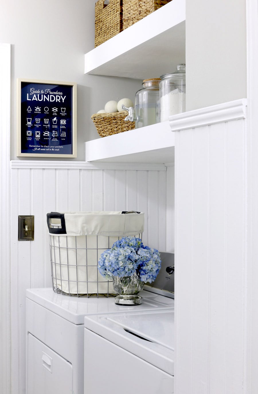 White Floating Shelves for a Small Laundry Room, made with supplies from the craft or hardware store