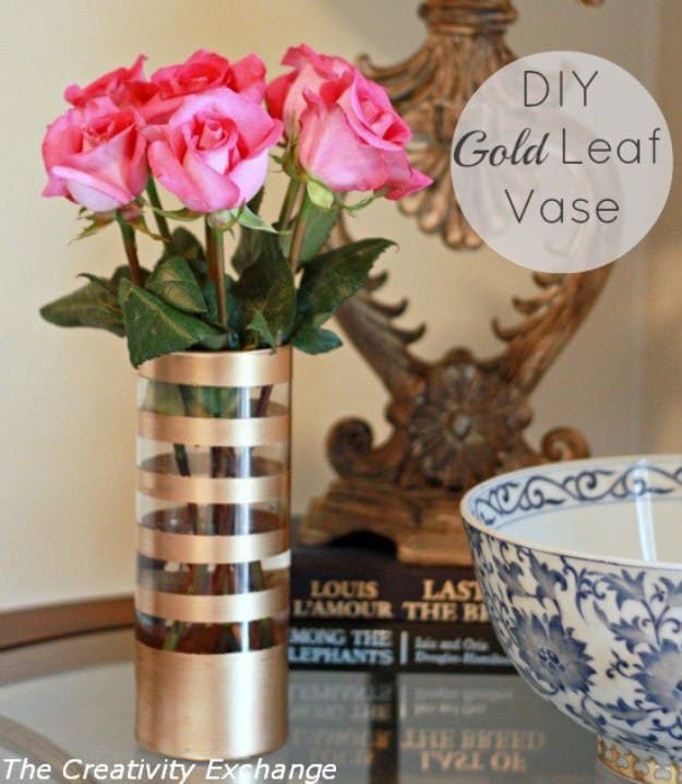 Crafts to make and sell: a thrifted glass vase half gilded in gold leaf with fresh pink roses, an elegant home decor craft