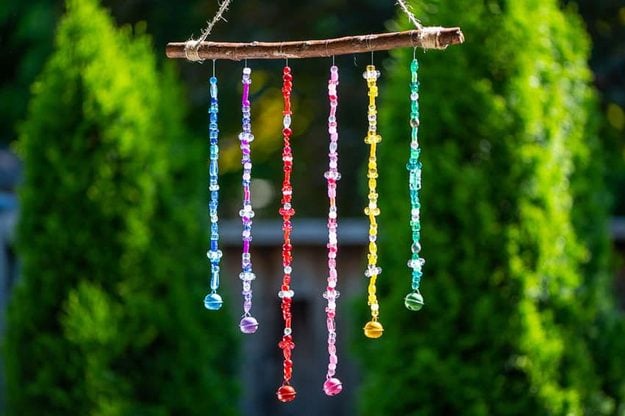 DIY Beaded Wind Chime, quick to put together in an afternoon and a nice way to make a plain corner feel finished