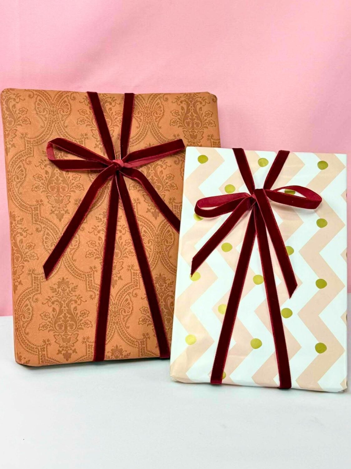 Five Minute Ribbon Tying Hack for Gifts A ribbon tied neatly around a wrapped gift with an even bow that sits centered instead of sliding to one side