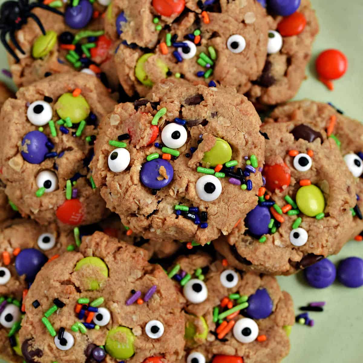 Oatmeal Candy Monster Eye Cookies Oatmeal monster cookies loaded with colorful candy pieces, chocolate chips and assorted candy eyes for Halloween