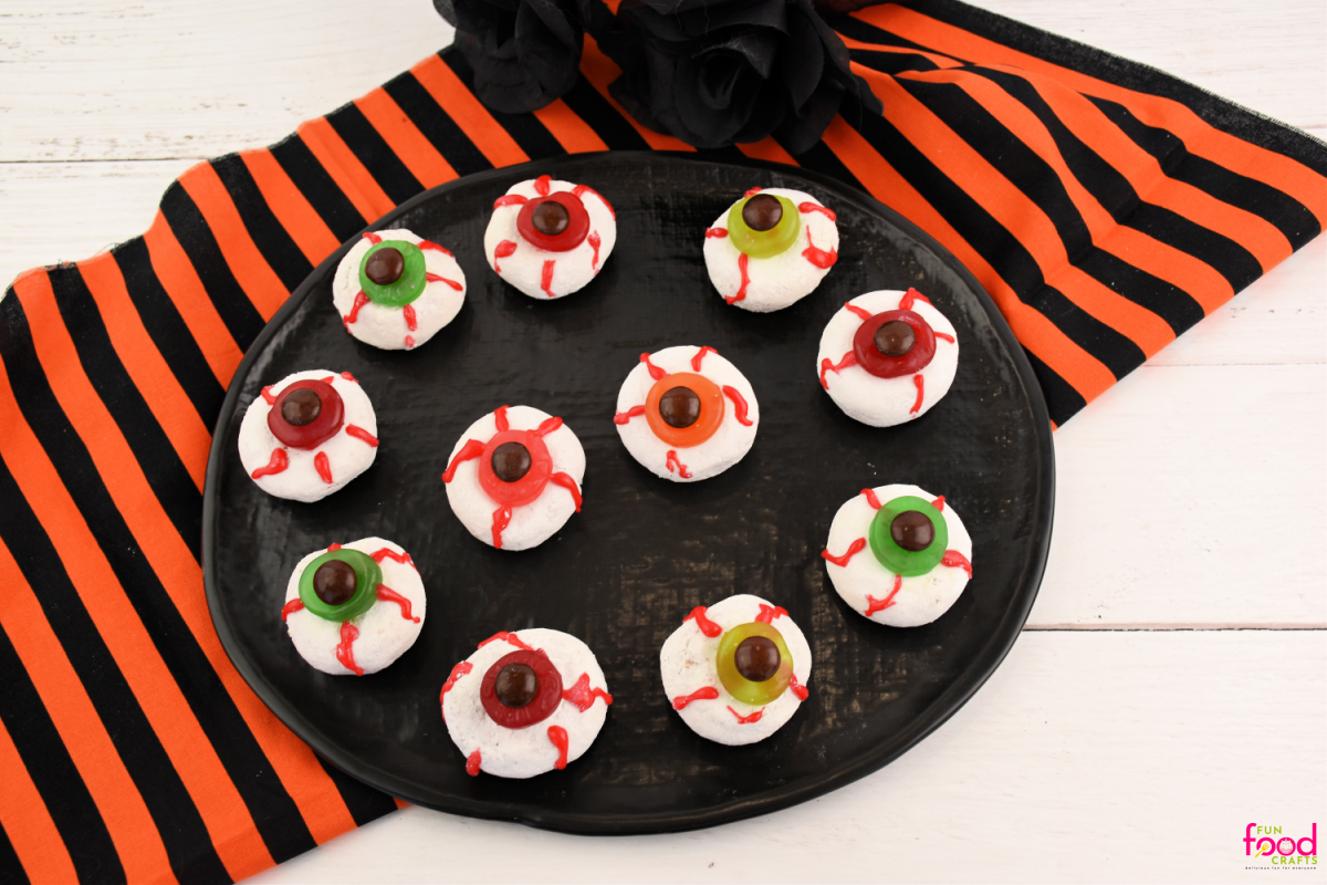Spooky dessert idea, savory or sweet party dish and festive appetizer inspiration, focused on creepy Halloween eyeball donuts
