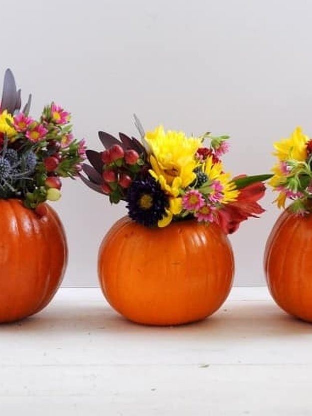 31 Pumpkin Decorating Ideas To Make This Fall - Mini Pumpkin Vases With Fresh Flowers - Easy DIY Pumpkin Decor Ideas for Home, Yard, Outdoors - Cool Pumpkin Decorating Ideas for Adults and Kids Party, Creative Crafts With Paint, Glitter and No Carve Projects for Halloween 
