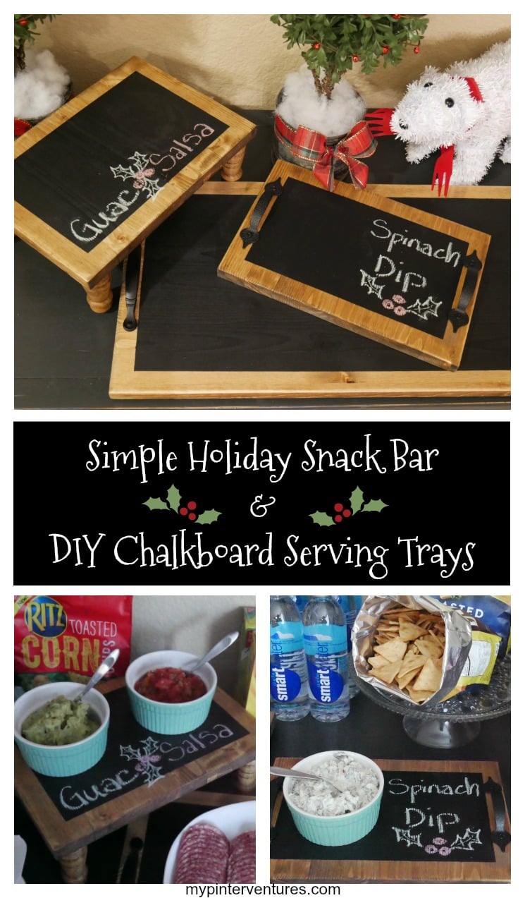 Three wood-framed chalkboard serving trays with black handles, labeled Guac Salsa and Spinach Dip, on a holiday table