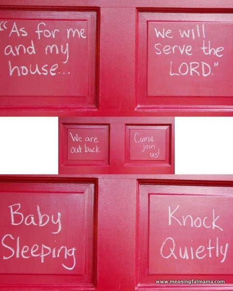 Red front door with clear chalkboard paint panels lettered As for me and my house, Baby Sleeping and Knock Quietly in chalk