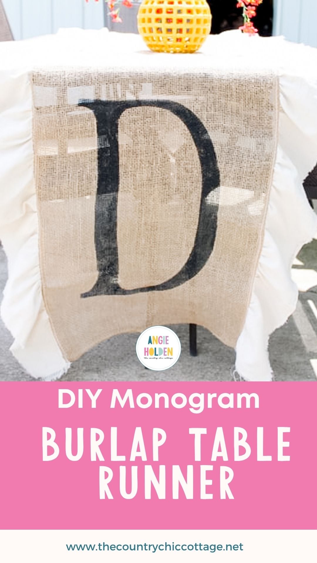 Monogram burlap table runner, a burlap runner painted with a large black letter D and edged in white ruffles on a patio table