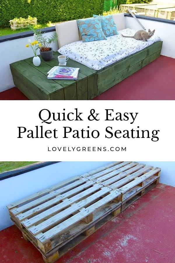 DIY patio day bed of green painted pallets with a white mattress and teal pillows on a red patio, a cat resting on it