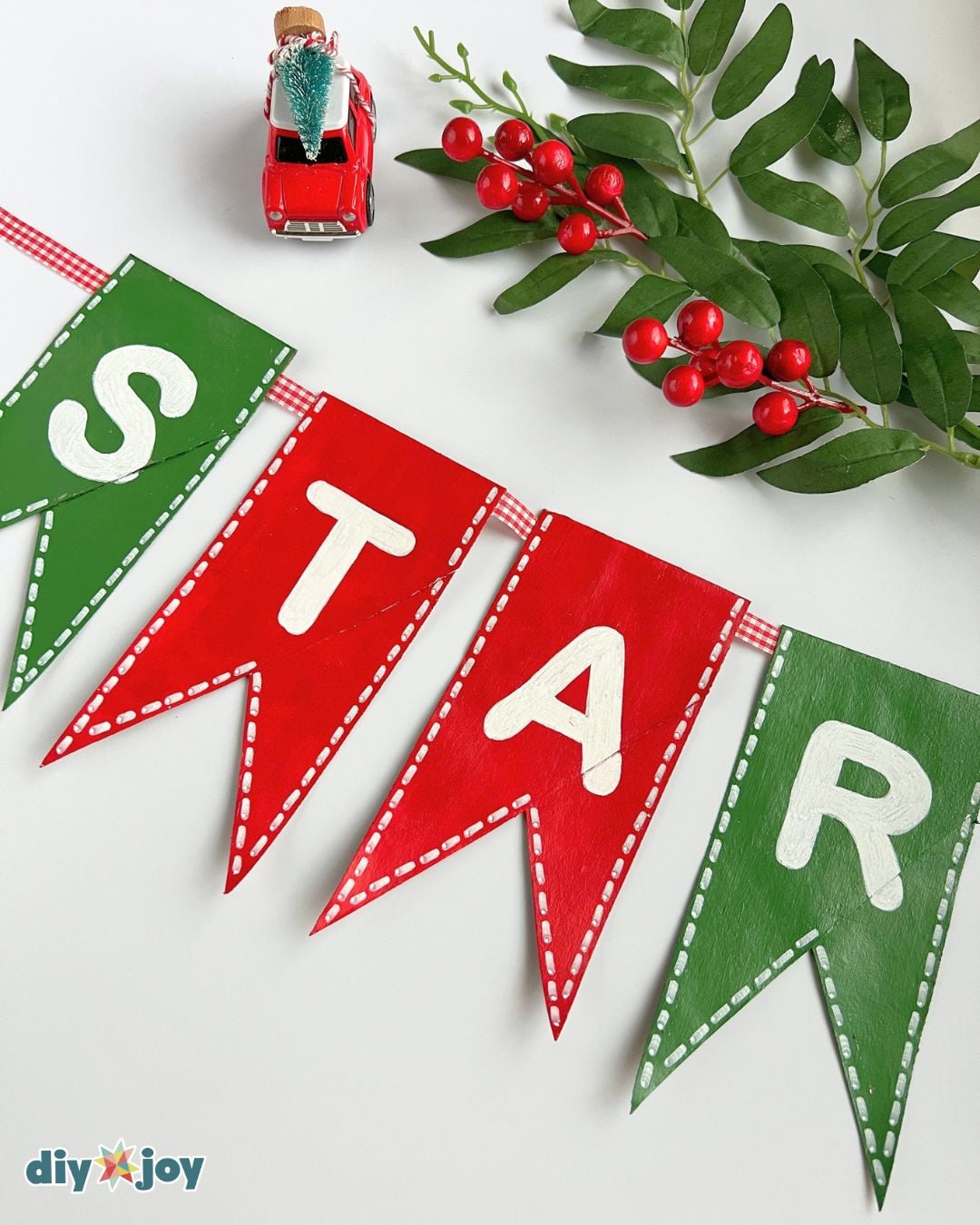 Flat cardboard pieces from soaked tubes, the first stage of an easy toilet paper roll Christmas banner for holiday decor