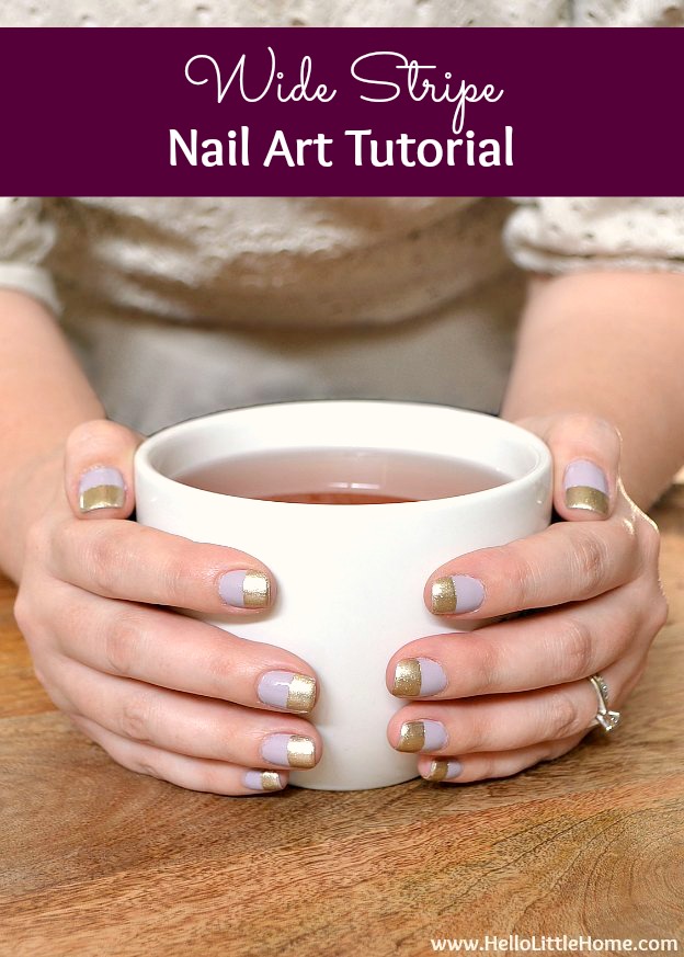 Easy Wide Stripe Nail Art | Quick Nail Art Idea Hands around a white mug showing wide stripe nail art with soft lilac polish on the lower half and shimmery gold on the tips