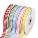 Gingham Ribbon for a Christmas Banner Gingham ribbon for hanging the pennants and trimming the wreath pieces of a toilet paper roll Christmas banner decoration